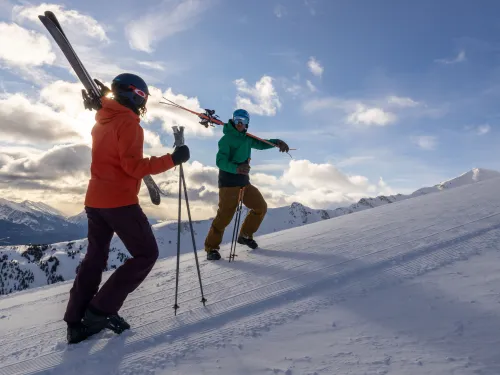 two skiers enjoying a bluebird day at Marmot basin