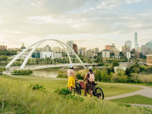 Biking to a view of the North Saskatchewan River and downtown Edmonton from Walterdale Hill, Edmonton, AB.