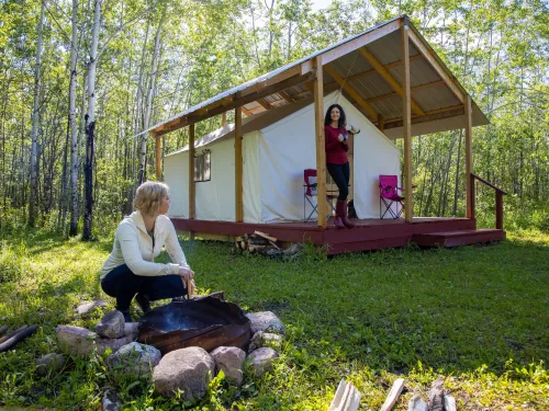 Morning by the fire at Hideaway Adventure Grounds near Lac La Biche, AB.