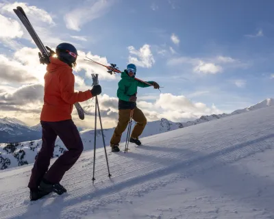 two skiers enjoying a bluebird day at Marmot basin