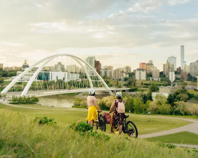 Biking to a view of the North Saskatchewan River and downtown Edmonton from Walterdale Hill, Edmonton, AB.