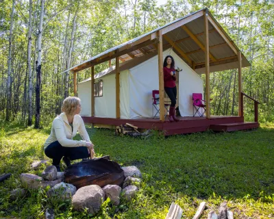 Morning by the fire at Hideaway Adventure Grounds near Lac La Biche, AB.