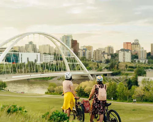 Biking to a view of the North Saskatchewan River and downtown Edmonton from Walterdale Hill, Edmonton, AB.